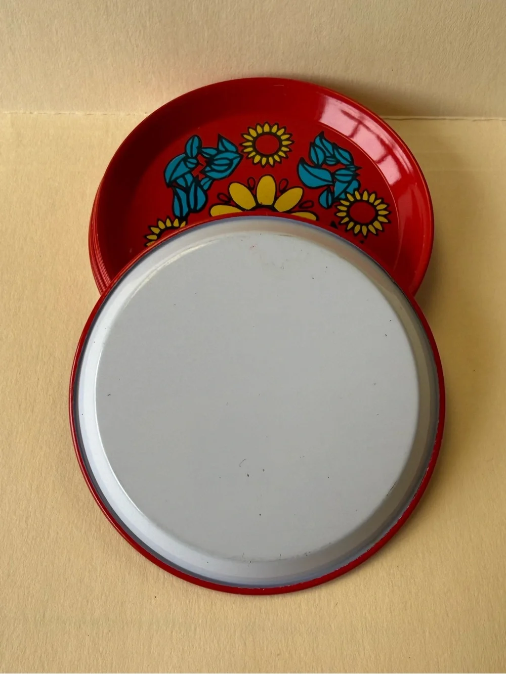 Vintage Set of 6 MCM Metal Floral Coasters in Red Yellow and Blue Made in Brazil